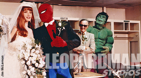 Stan Lee looks on at the happy couple